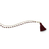 Double Strand Bracelet with Garnet and a Tassel