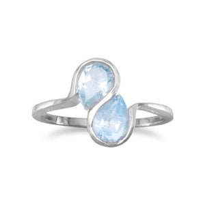 Blue Topaz Ring with Wavy Band Design